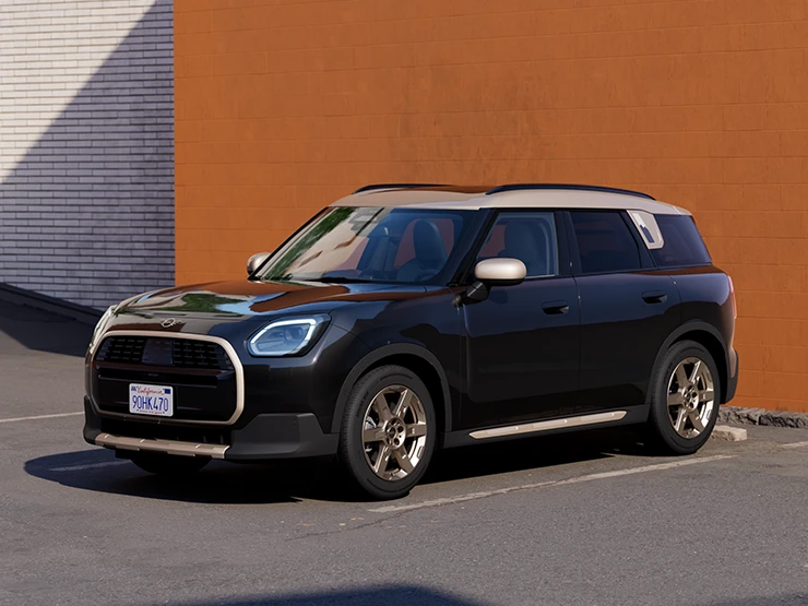 Pohled zepředu zaparkované na MINI Countryman v černé barvě Midnight Black a se stříbrnou střechou Vibrant Silver.