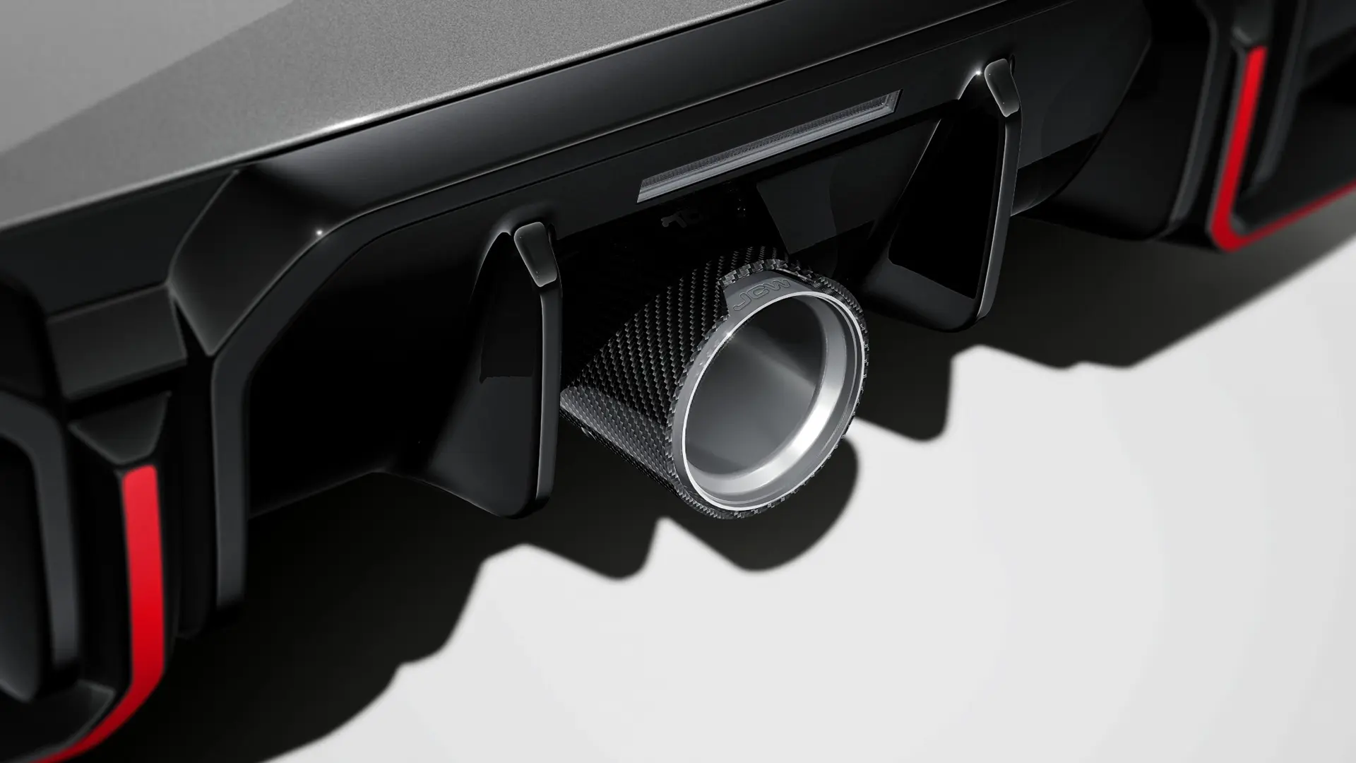 JCW Příslušenství – JCW Zadní difuzor v leskle černém provedení.