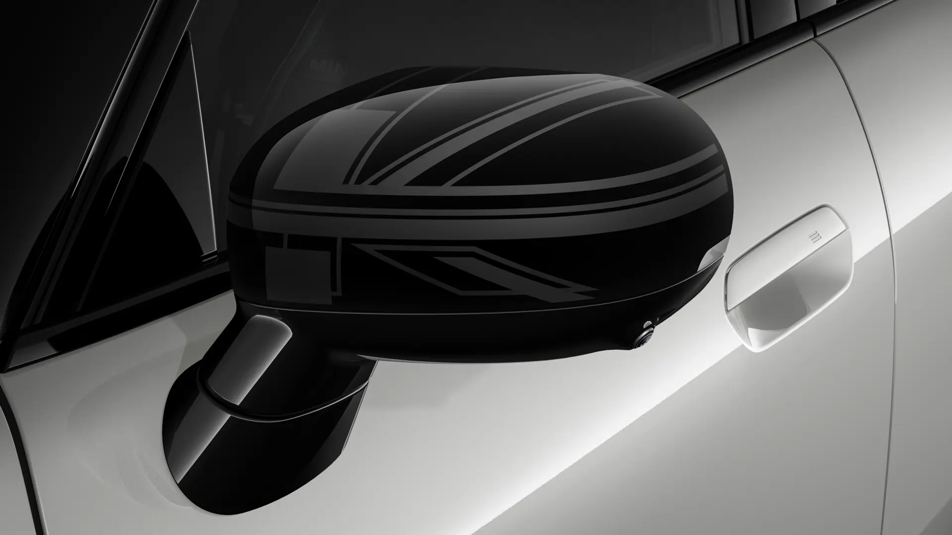 Třídveřové MINI Cooper ve stříbrné barvě s kryty vnějších zpětných zrcátek v designu Night Union Jack.