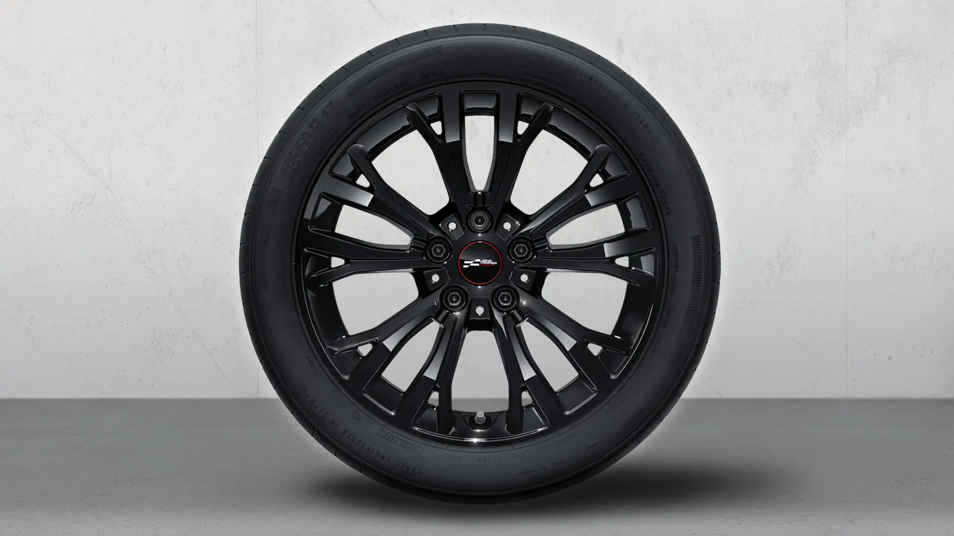 17" John Cooper Works kolo z lehké slitiny Star Spoke 962, kompletní zimní kolo v černé barvě Jet Black.