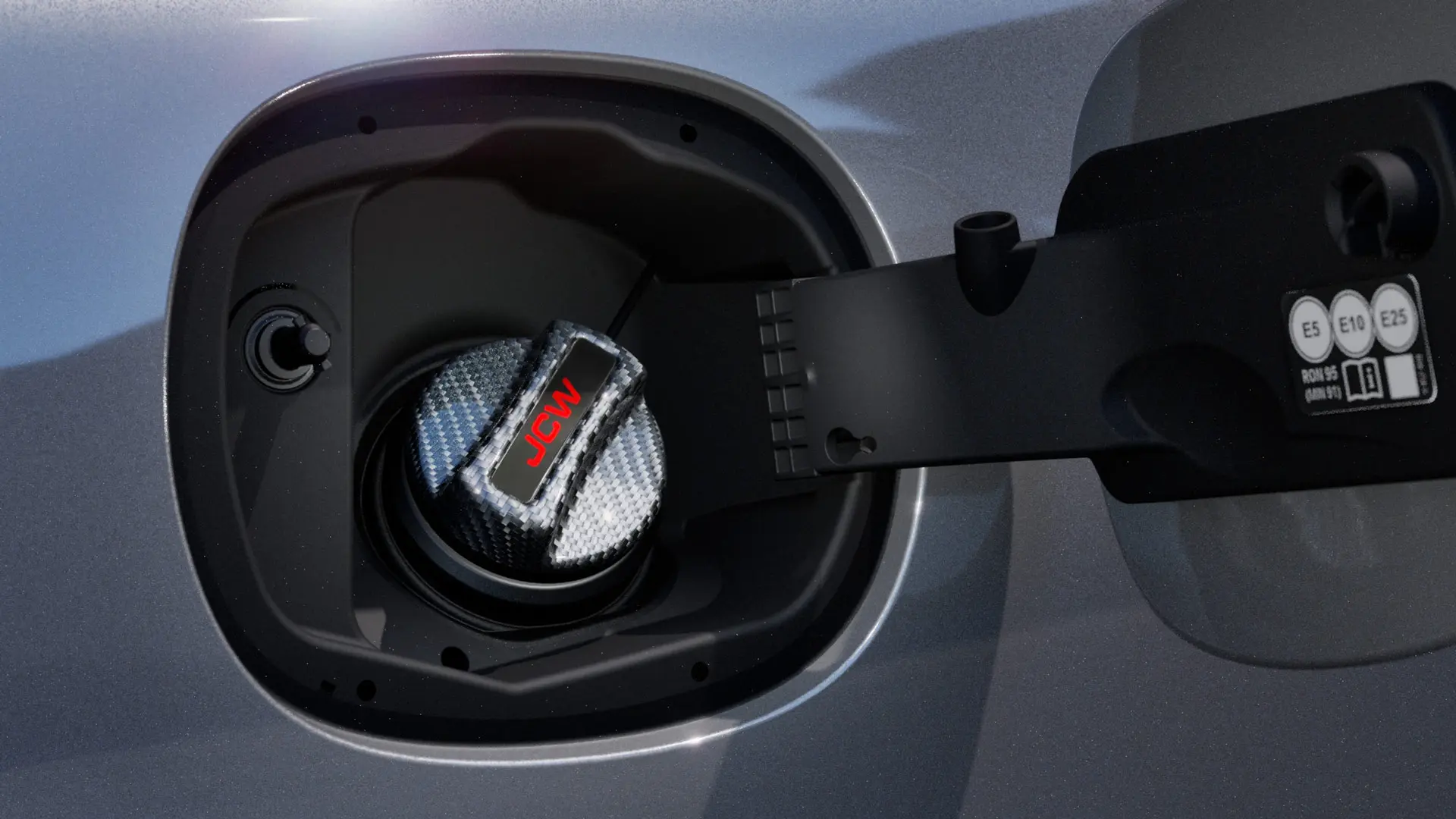 John Cooper Works víčko palivové nádrže s nápisem JCW.